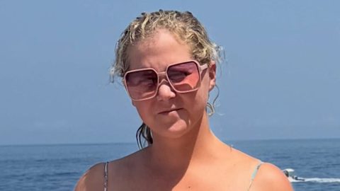 Amy Schumer shows off her 50lb weight loss in a skimpy bikini for lavish boat day