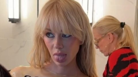 Olivia Attwood covers her modesty in a sheer PVC top and sizzles in a bikini as she shares behind the scenes snaps of her racy Cosmopolitan photoshoot