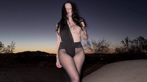 Miley Cyrus’ little sister Noah strips off thong bodysuit and bares her breast in bizarre desert photoshoot