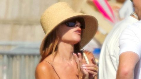 Victoria Beckham, 52, wows in stylish brown satin dress as she takes fashion inspiration from daughter Harper’s wardrobe as family head into St Tropez amid £16M luxury yacht holiday