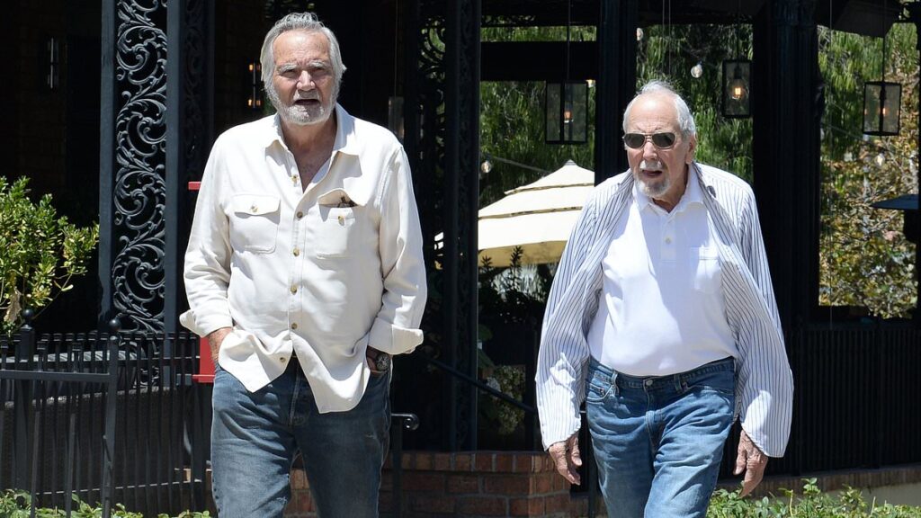 Beloved soap opera star, 82, and acting legend, 90, who had FIVE roles in gothic TV serial step out for a stroll in LA… can you guess who they are?