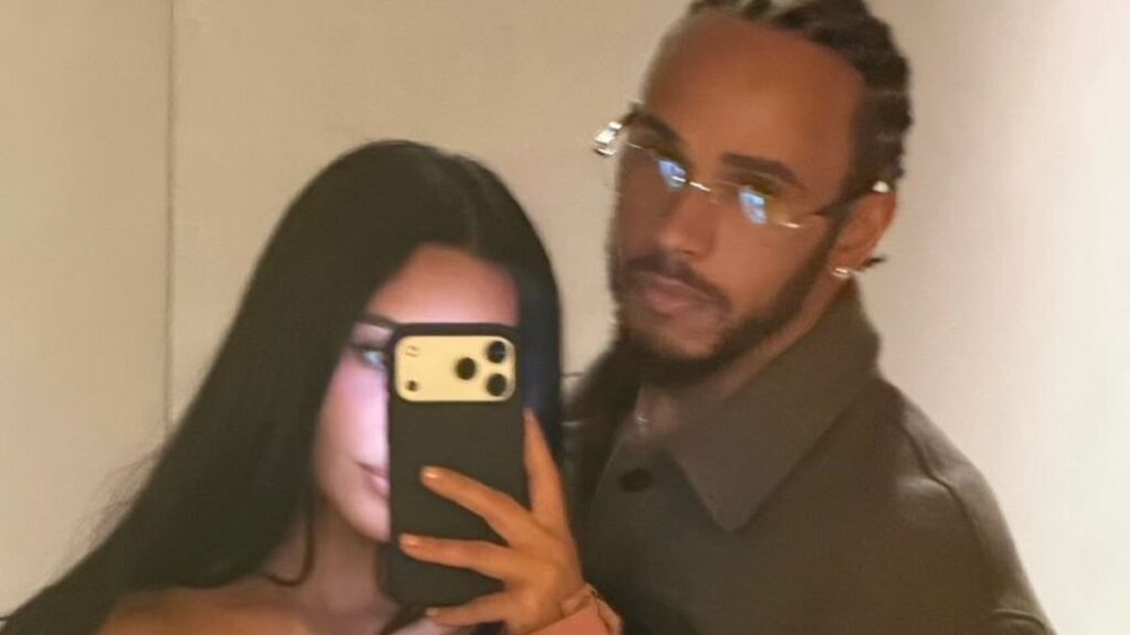 Kim Kardashian cosies up to boyfriend Lewis Hamilton before posing in a bikini in loved-up snaps after the F1 star shared how she ‘makes him happier’