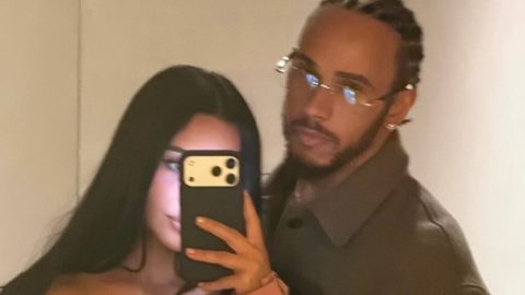 Kim Kardashian cosies up to boyfriend Lewis Hamilton before posing in a bikini in loved-up snaps after the F1 star shared how she ‘makes him happier’