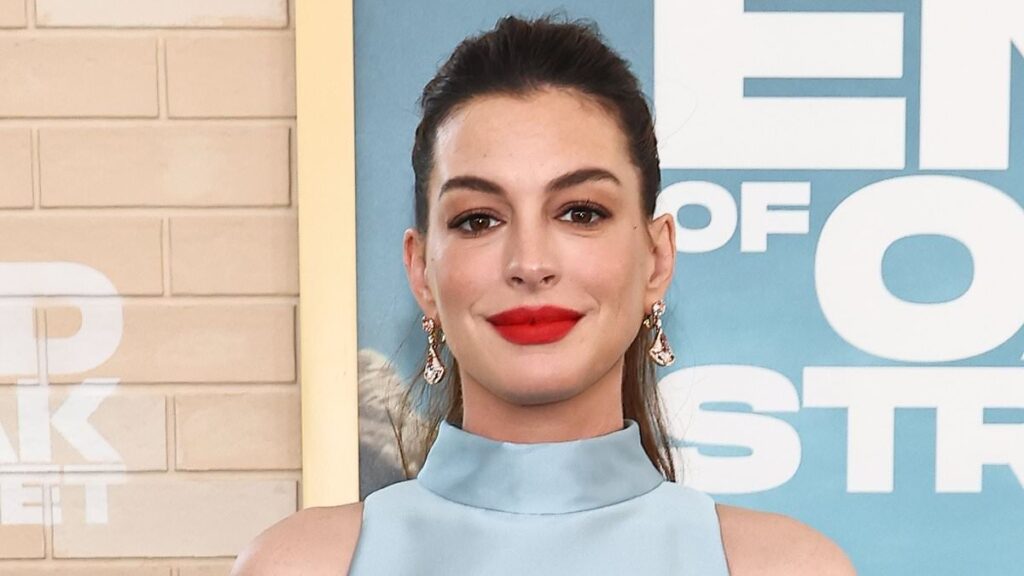 Anne Hathaway, 43, roasted over ‘ridiculous’ maternity outfit as she shows off baby bump at LA premiere