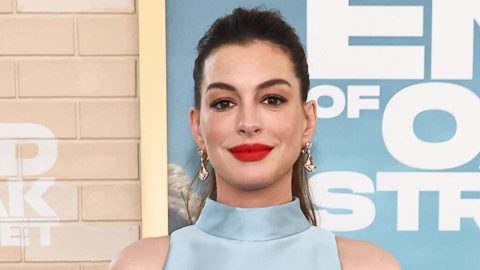 Anne Hathaway, 43, roasted over ‘ridiculous’ maternity outfit as she shows off baby bump at LA premiere