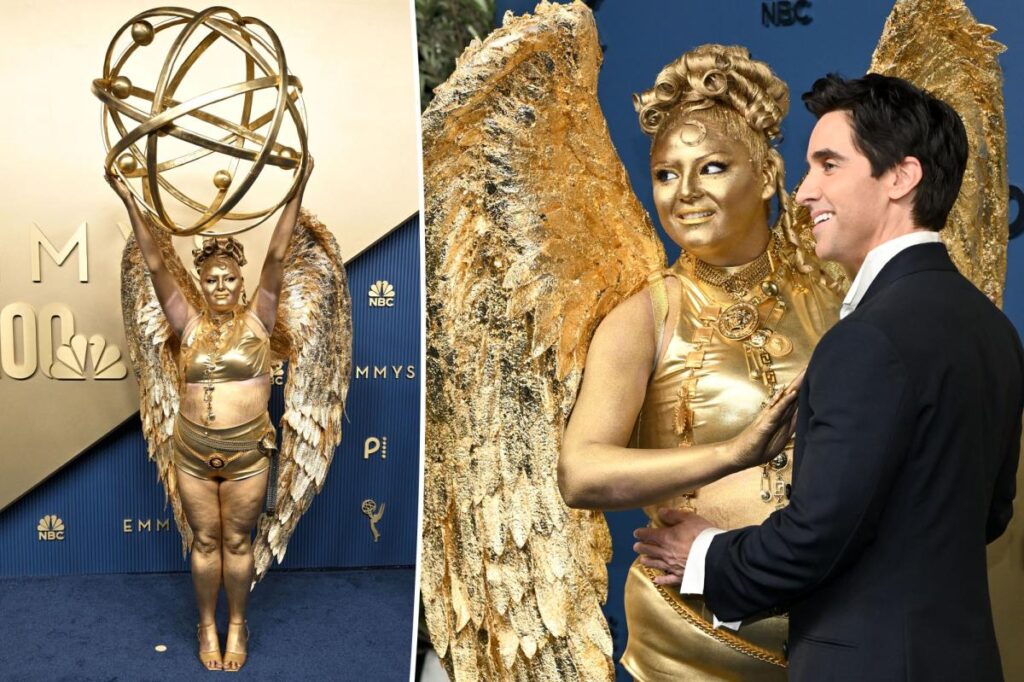 Meg Stalter dressed as an Emmy statue on Emmys 2026 red carpet