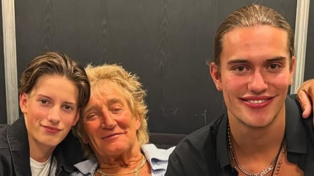 Sir Rod Stewart poses for a sweet snap with his sons Alastair, 19, and Aiden, 14, as Penny gushes over ‘my boys’