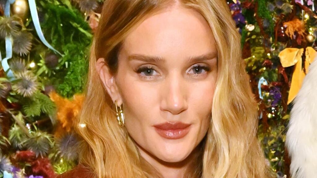 Rosie Huntington-Whiteley stuns in a brown leather trench as she joins trendy Hannah Waddingham, Patsy Kensit and Emma Weymouth at the Burberry Christmas tree unveiling