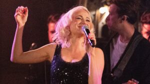 Pixie Lott performs a VERY energetic dance routine just two months after giving birth as she dedicates her new Christmas song to her newborn baby