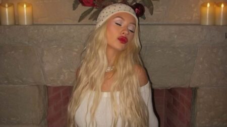 Christina Aguilera shows off 50-pound weight loss as she celebrates her 45th birthday in curve-clinging dress