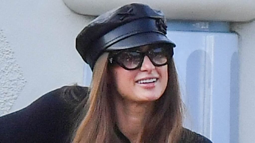 Paris Hilton is busted! Star, 44, is caught using a brown WIG to go incognito at Disneyland