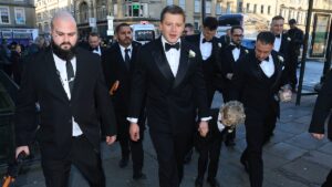 Adam Peaty prepares for today’s wedding to Holly Ramsay as security guards go on patrol with dogs ahead of union that has torn his family apart