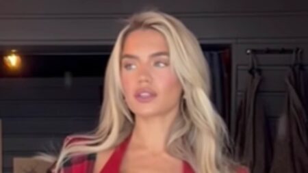 Love Island’s Molly Smith shows off her incredible figure in a red bikini top and tartan hotpants as she and fiancé Tom Clare unveil their kitchen renovation