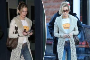 Bella Hadid wears totally sheer lace coat in freezing Aspen weather ahead of the new year