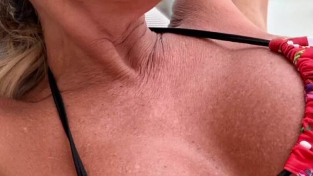 Happy new rear! Aussie TV presenter, 53, shows off her bare bottom in skimpy bikini – after bragging ‘hot men in their 20s’ are desperate to date her