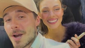 Brooklyn Beckham snubs estranged dad David’s New Year olive branch as he puts on a PDA with wife Nicola Peltz and parties with 50 Cent in a raucous Florida nightclub