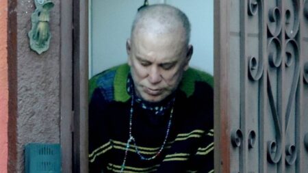 Bald Mickey Rourke, 73, emerges for Taco Bell at LA home he faces eviction from over $60k unpaid rent