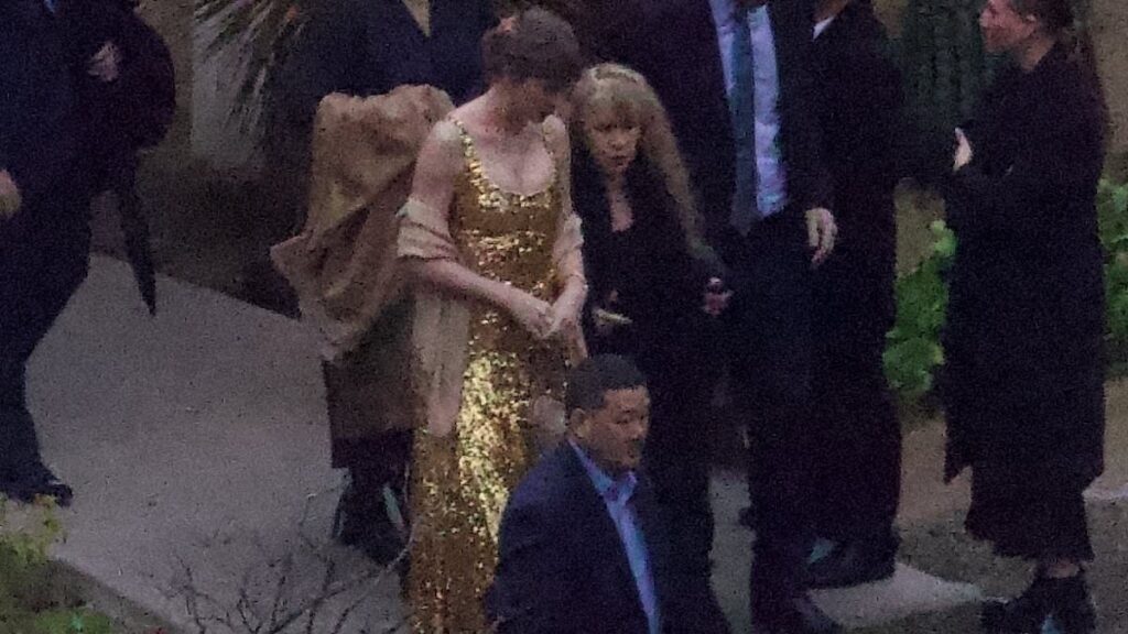 Taylor Swift’s wedding dress at BFF Este Haim’s nuptials has fans spotting secret Easter Egg