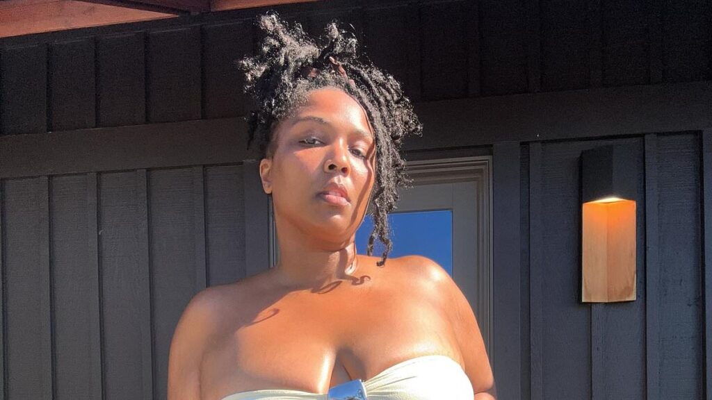 Lizzo strips down to a tiny bikini as she shows off her shrinking frame after 60lbs weight loss and hitting back at shamers online