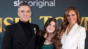 Robbie Williams reveals heartbreaking text his actress daughter Teddy, 13, sent to him at 2am as he admits she’s ‘desperate’ to be famous and reveals fears over her ‘oversensitive’ nature