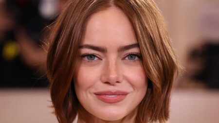 Emma Stone’s VERY taut face steals show at 2026 Golden Globes as fans speculate star went under the knife