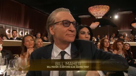 Bill Maher looks stone-faced as Wanda Sykes mockingly begs him to ‘do less’ at 2026 Golden Globes