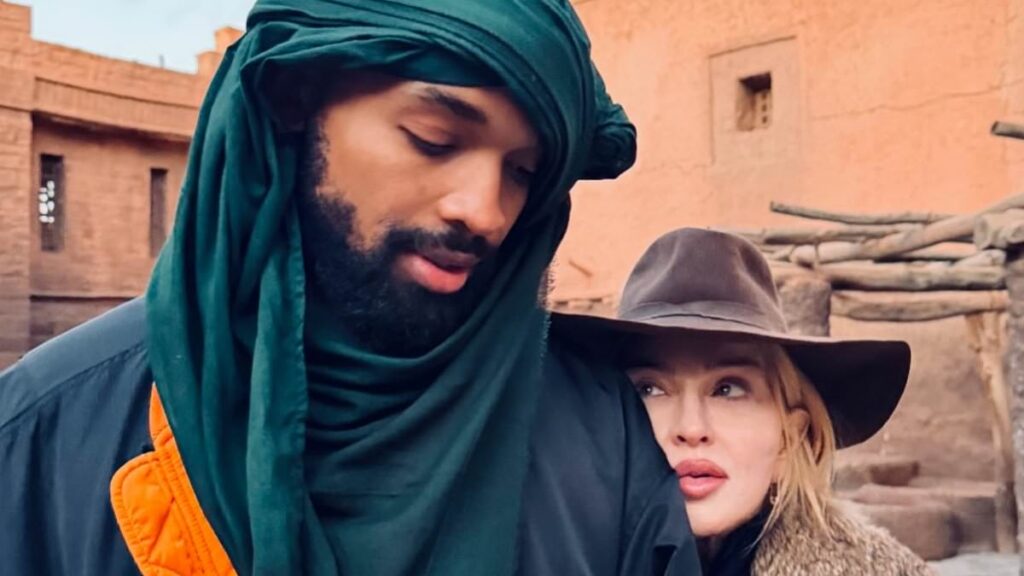 Madonna, 67, soaks up the sun in Morocco with boyfriend Akeem Morris, 29, and her son Rocco, 25, as she shares a glimpse into family trip to the desert