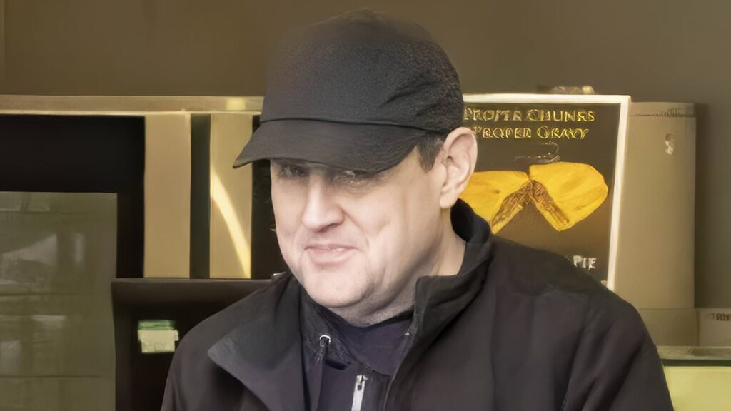 Picking up a garlic bread? Peter Kay tucks into a tasty treat from a local bakery in Bolton after opening up about his dramatic weight-loss for the first time