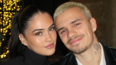 Romeo Beckham heads to Paris with Kim Turnbull for Fashion Week amid bitter row with brother Brooklyn