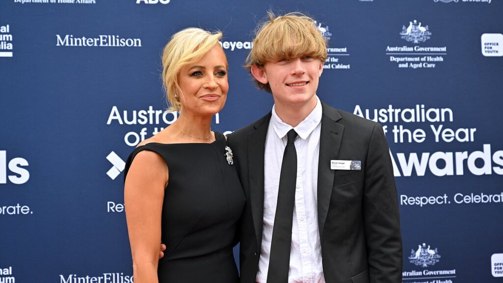 Carrie Bickmore steps out with lookalike son Ollie as she’s honoured at the Australian of the Year Awards