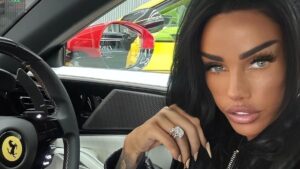 Katie Price poses in her £180k Ferrari ‘wedding present’ as her new husband Lee Andrews’ exes warn her to ‘run for the hills’ as they brand him a ‘lying swindler who preys on women’