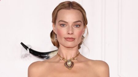 Margot Robbie stuns in Elizabeth Taylor’s iconic necklace as she is joined by Jacob Elordi at Wuthering Heights premiere in LA