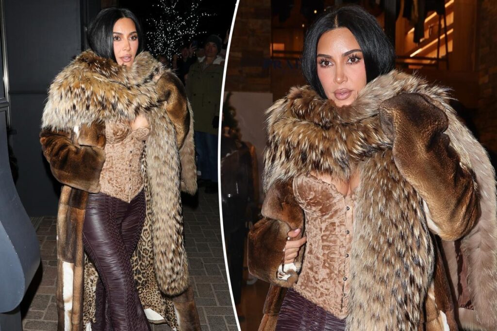 Kim Kardashian heats up Aspen in velvet corset and lace-up leather pants