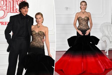 Margot Robbie rocks crimson and black look alongside Jacob Elordi at ‘Wuthering Heights’ premiere