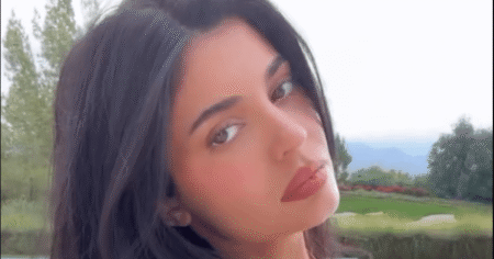 Kylie Jenner Proclaims She’s in a ‘Summa Forever’ Mood While Posing in Teeny Golden Bikini