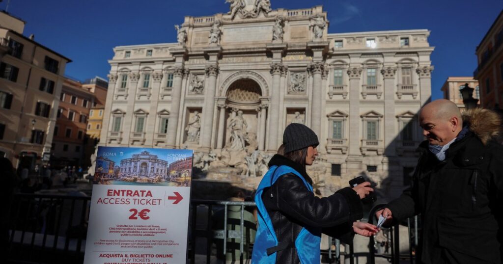 Rome introduces Trevi Fountain access fee to curb coin-tossing crowds