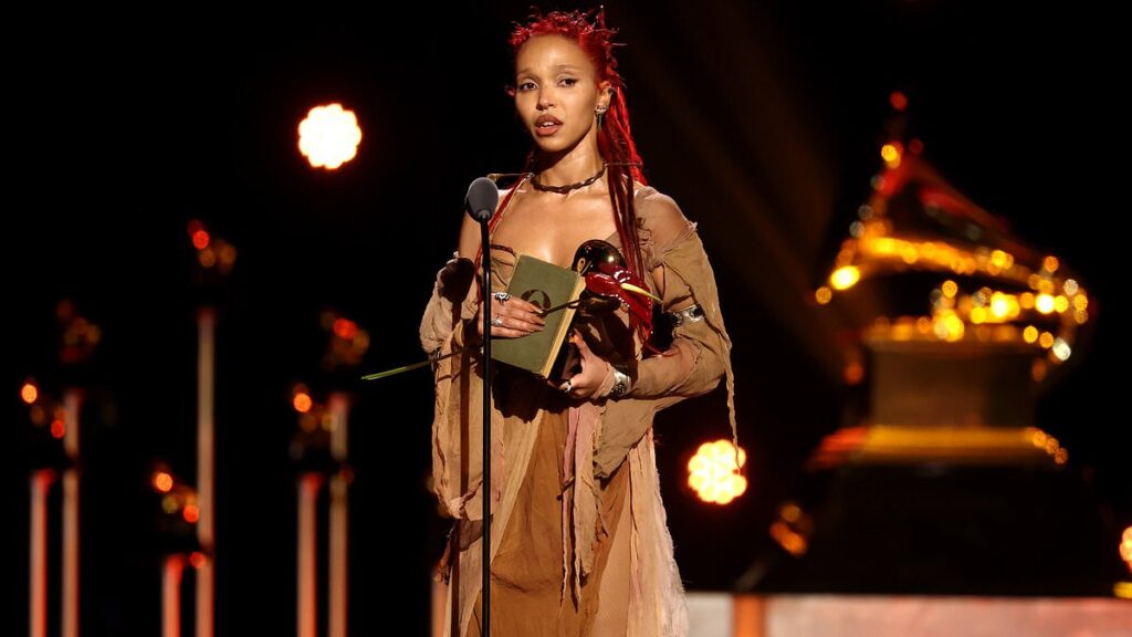 FKA Twigs pays tribute to beloved boyfriend Jordan Hemingway as she wins her first ever Grammy after turning heads on the red carpet