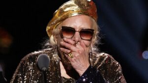 Joni Mitchell, 82, lapses into long pause in speech at 2026 Grammy Awards and then asks: ‘Oh, I won?’