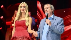 His Lady In Red! Chris de Burgh makes a rare appearance with beauty queen daughter Rosanna Davison at confectionery event in Berlin