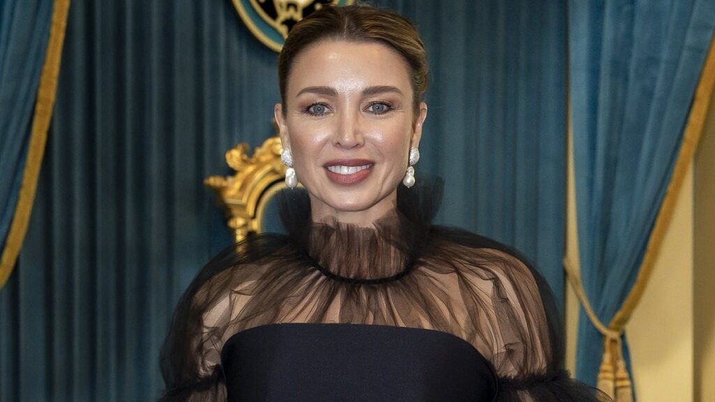 Dannii Minogue, 54, cuts a very youthful figure as she leads arrivals at Melbourne Fashion Festival launch