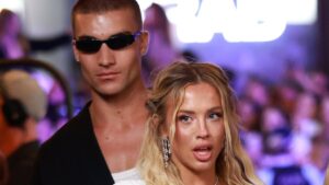 Tammy Hembrow’s ‘fame hungry’ new man denies claims he had a recent girlfriend after photos emerge of the pair looking VERY close over Christmas