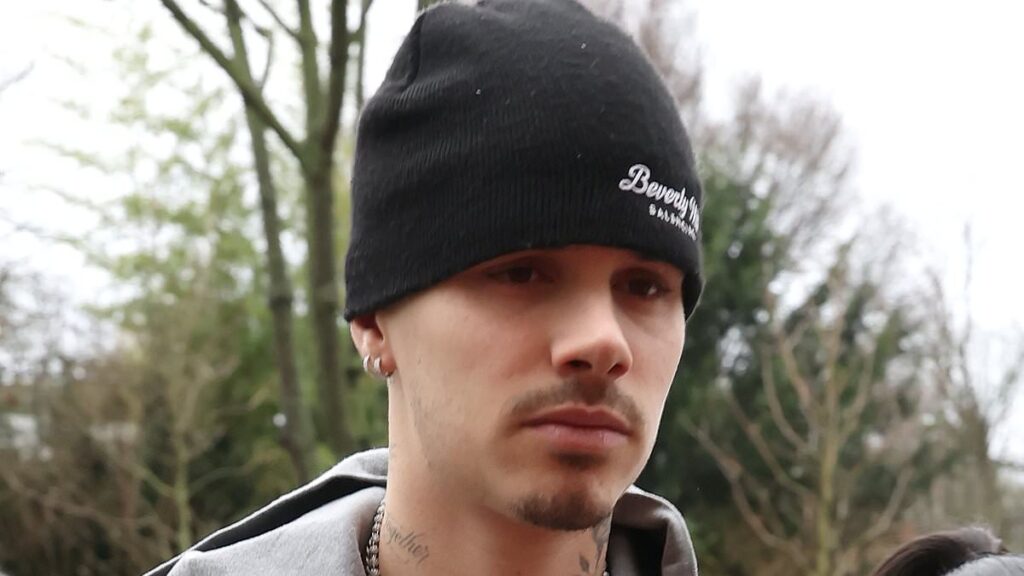 Romeo Beckham ‘likes’ post about how ‘Nicola Peltz is the problem’ as pop culture influencer claims David and Victoria are ‘trying to rescue their son’ amid bitter feud