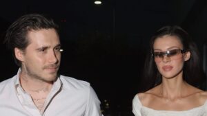 Brooklyn Beckham hangs on to his ‘favourite’ £220k watch gifted by his dad David as he brings his own £3k wine for dinner with wife Nicola Peltz after erasing his tattoo tributes amid family feud