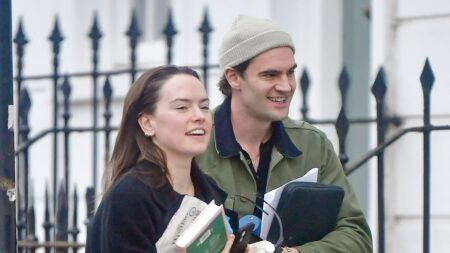 Daisy Ridley wraps up in black coat as she steps out with husband Tom Bateman in London