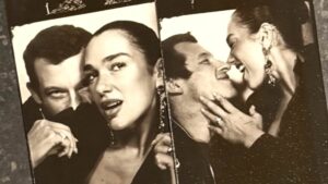 Loved-up Dua Lipa packs on the PDA with fiancé Callum Turner in flirty photo booth snaps as she gives fans a look into their romantic Paris break