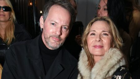Kim Cattrall, 69, and husband Russell Thomas, 54, make first appearance since secret wedding as the loved-up couple attend Conner Ives’ LFW show