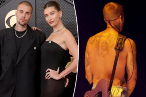 Justin Bieber debuts back tattoo dedicated to wife Hailey during Grammys 2026