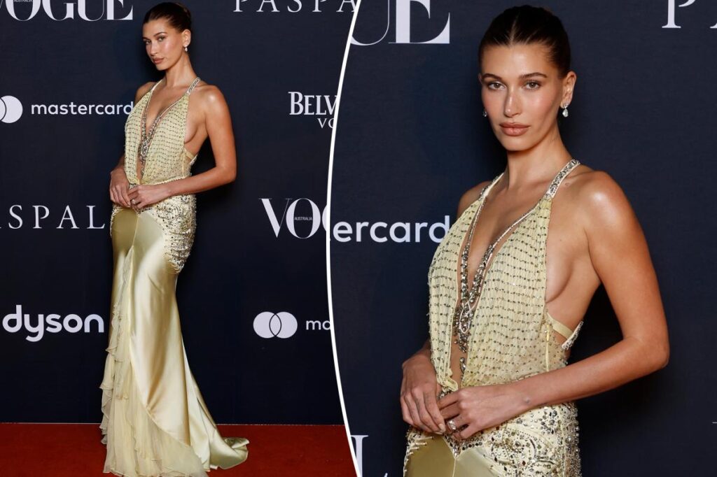 Hailey Bieber wears plunging vintage Versace at Vogue Forces of Fashion Sydney