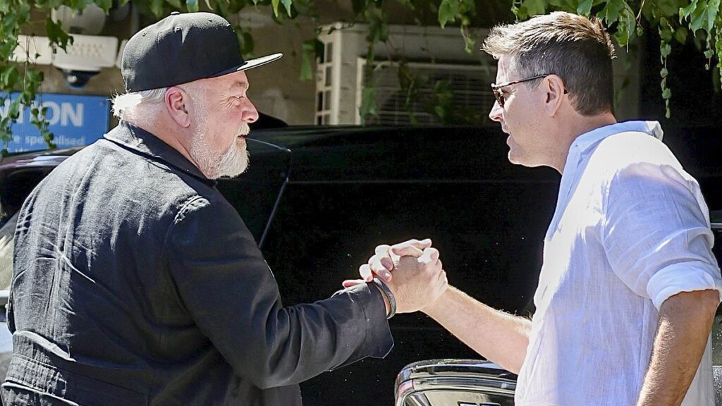 Kyle Sandilands sets tongues wagging about his future at KIIS FM as he holds meeting with new Nine radio owner Stu Laundy