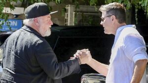 Kyle Sandilands sets tongues wagging about his future at KIIS FM as he holds meeting with new Nine radio owner Stu Laundy